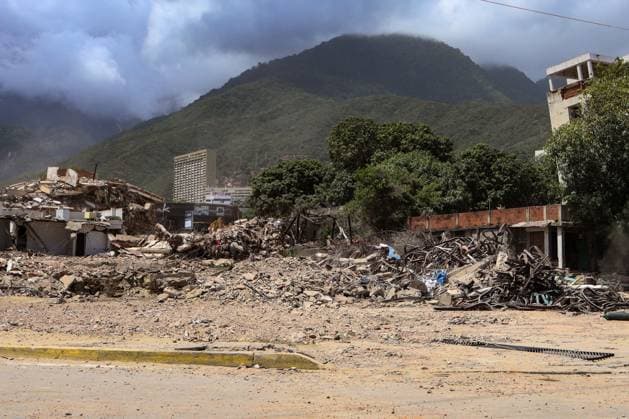 Cleanup operations continue in Caraballeda after disaster CARABALLEDA, LA GUAIRA, VENEZUELA JULY 30, 2026: Heavy machinery operates in the Caraballeda and Los Corales sectors of La Guaira state as crews carry out debris removal, sanitation work and ground leveling near residential areas. The continuous movement of dump trucks and earthmoving equipment reflects ongoing efforts to clear affected areas and prepare the terrain for recovery operations. La Guaira Venezuela (Bolivarian Republic of) Copyright: x xMarioxFloresx xJNAxPressx