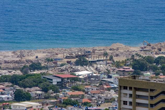 July 31, 2026, La Guaira, Venezuela (Bolivarian Republic of: CARABALLEDA, LA GUAIRA, VENEZUELA Ã¢â‚¬ JULY 30, 2026: Heavy machinery operates in the Caraballeda and Los Corales sectors of La Guaira state as crews carry out debris removal, sanitation work and ground leveling near residential areas. The continuous movement of dump trucks and earthmoving equipment reflects ongoing efforts to clear affected areas and prepare the terrain for recovery operations. La Guaira Venezuela (Bolivarian Republic of - ZUMAq101 20260731_zna_q101_248 Copyright: xMarioxFloresx