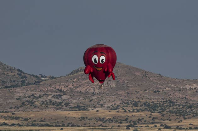 7th Cappadocia Balloon Festival NEVSEHIR, TURKIYE - AUGUST 01: Figure-shaped hot air balloons float above Cappadocia s fairy chimneys during the seventh Cappadocia Balloon Festival, on August 01, 2026 in Nevsehir, Turkiye. Organized by the Ministry of Culture and Tourism, the festival features 30 specially designed balloons brought from Turkiye and several other countries. During sunrise demonstration flights over Goreme, balloons shaped like hearts, owls, parrots, rockets and the Earth attracted the attention of local and international visitors. Osmancan Gurdogan Anadolu Nevsehir Turkey. Editorial use only. Please get in touch for any other usage.  Copyright: x2026xAnadoluxOsmancanxGurdoganx