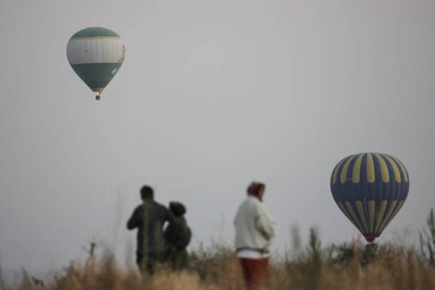 7th Cappadocia Balloon Festival NEVSEHIR, TURKIYE - AUGUST 01: Figure-shaped hot air balloons float above Cappadocia s fairy chimneys during the seventh Cappadocia Balloon Festival, on August 01, 2026 in Nevsehir, Turkiye. Organized by the Ministry of Culture and Tourism, the festival features 30 specially designed balloons brought from Turkiye and several other countries. During sunrise demonstration flights over Goreme, balloons shaped like hearts, owls, parrots, rockets and the Earth attracted the attention of local and international visitors. Osmancan Gurdogan Anadolu Nevsehir Turkey. Editorial use only. Please get in touch for any other usage.  Copyright: x2026xAnadoluxOsmancanxGurdoganx