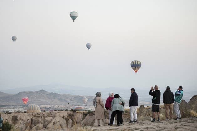 7th Cappadocia Balloon Festival NEVSEHIR, TURKIYE - AUGUST 01: Figure-shaped hot air balloons float above Cappadocia s fairy chimneys during the seventh Cappadocia Balloon Festival, on August 01, 2026 in Nevsehir, Turkiye. Organized by the Ministry of Culture and Tourism, the festival features 30 specially designed balloons brought from Turkiye and several other countries. During sunrise demonstration flights over Goreme, balloons shaped like hearts, owls, parrots, rockets and the Earth attracted the attention of local and international visitors. Osmancan Gurdogan Anadolu Nevsehir Turkey. Editorial use only. Please get in touch for any other usage.  Copyright: x2026xAnadoluxOsmancanxGurdoganx