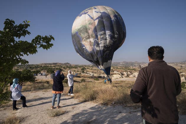 7th Cappadocia Balloon Festival NEVSEHIR, TURKIYE - AUGUST 01: Figure-shaped hot air balloons float above Cappadocia s fairy chimneys during the seventh Cappadocia Balloon Festival, on August 01, 2026 in Nevsehir, Turkiye. Organized by the Ministry of Culture and Tourism, the festival features 30 specially designed balloons brought from Turkiye and several other countries. During sunrise demonstration flights over Goreme, balloons shaped like hearts, owls, parrots, rockets and the Earth attracted the attention of local and international visitors. Osmancan Gurdogan Anadolu Nevsehir Turkey. Editorial use only. Please get in touch for any other usage.  Copyright: x2026xAnadoluxOsmancanxGurdoganx