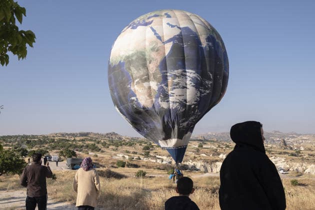 7th Cappadocia Balloon Festival NEVSEHIR, TURKIYE - AUGUST 01: Figure-shaped hot air balloons float above Cappadocia s fairy chimneys during the seventh Cappadocia Balloon Festival, on August 01, 2026 in Nevsehir, Turkiye. Organized by the Ministry of Culture and Tourism, the festival features 30 specially designed balloons brought from Turkiye and several other countries. During sunrise demonstration flights over Goreme, balloons shaped like hearts, owls, parrots, rockets and the Earth attracted the attention of local and international visitors. Osmancan Gurdogan Anadolu Nevsehir Turkey. Editorial use only. Please get in touch for any other usage.  Copyright: x2026xAnadoluxOsmancanxGurdoganx