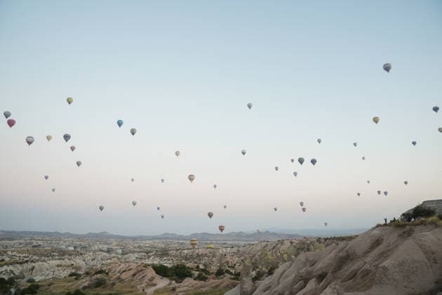 7th Cappadocia Balloon Festival NEVSEHIR, TURKIYE - AUGUST 01: Figure-shaped hot air balloons float above Cappadocia s fairy chimneys during the seventh Cappadocia Balloon Festival, on August 01, 2026 in Nevsehir, Turkiye. Organized by the Ministry of Culture and Tourism, the festival features 30 specially designed balloons brought from Turkiye and several other countries. During sunrise demonstration flights over Goreme, balloons shaped like hearts, owls, parrots, rockets and the Earth attracted the attention of local and international visitors. Osmancan Gurdogan Anadolu Nevsehir Turkey. Editorial use only. Please get in touch for any other usage.  Copyright: x2026xAnadoluxOsmancanxGurdoganx