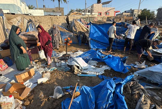 Displaced Palestinians inspect damage after Israeli strike in Deir al-Balah Displaced Palestinians inspect the damage to their tents and belongings following an Israeli airstrike that targeted the medical supplies and pharmaceuticals warehouse of Al-Aqsa Martyrs Hospital in Deir al-Balah, central Gaza Strip, on August 1, 2026. The strike caused extensive destruction to the warehouse and to tents sheltering displaced Palestinians near the targeted site. Photo by Ahmed Ibrahim apaimages Deir al-Balah Gaza Palestinian Territory 010826_Deir_al-Balah_AI_00(3) Copyright: xapaimagesxAhmedxIbrahimx xapaimagesx
