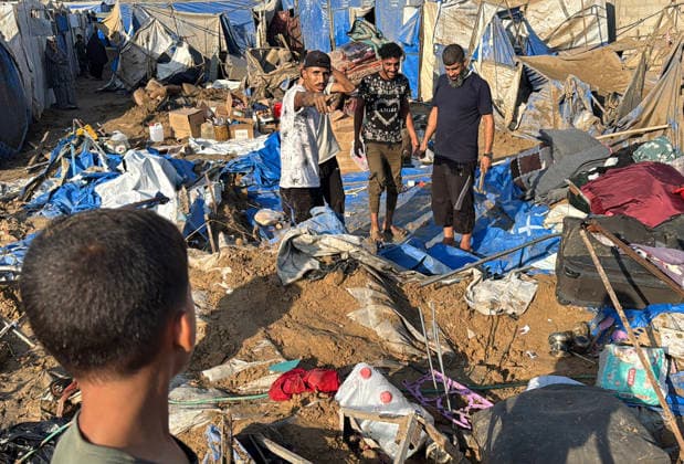Displaced Palestinians inspect damage after Israeli strike in Deir al-Balah Displaced Palestinians inspect the damage to their tents and belongings following an Israeli airstrike that targeted the medical supplies and pharmaceuticals warehouse of Al-Aqsa Martyrs Hospital in Deir al-Balah, central Gaza Strip, on August 1, 2026. The strike caused extensive destruction to the warehouse and to tents sheltering displaced Palestinians near the targeted site. Photo by Ahmed Ibrahim apaimages Deir al-Balah Gaza Palestinian Territory 010826_Deir_al-Balah_AI_00(13) Copyright: xapaimagesxAhmedxIbrahimx xapaimagesx