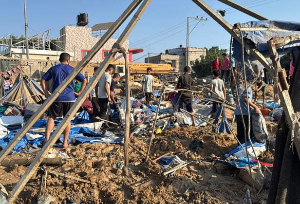 Displaced Palestinians inspect damage after Israeli strike in Deir al-Balah Displaced Palestinians inspect the damage to their tents and belongings following an Israeli airstrike that targeted the medical supplies and pharmaceuticals warehouse of Al-Aqsa Martyrs Hospital in Deir al-Balah, central Gaza Strip, on August 1, 2026. The strike caused extensive destruction to the warehouse and to tents sheltering displaced Palestinians near the targeted site. Photo by Ahmed Ibrahim apaimages Deir al-Balah Gaza Palestinian Territory 010826_Deir_al-Balah_AI_00(18) Copyright: xapaimagesxAhmedxIbrahimx xapaimagesx