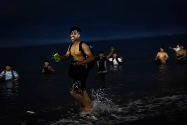 August 1, 2026, Ceuta, Spain: CEUTA, SPAIN - AUGUST 1, 2026: The arrival of migrants across the Tarajal border continues during the early hours of Saturday morning in Ceuta. Authorities maintain security and monitoring devices at the border crossing amid the ongoing influx. Ceuta Spain - ZUMAq101 20260801_zna_q101_058 Copyright: xSamuelxVegax