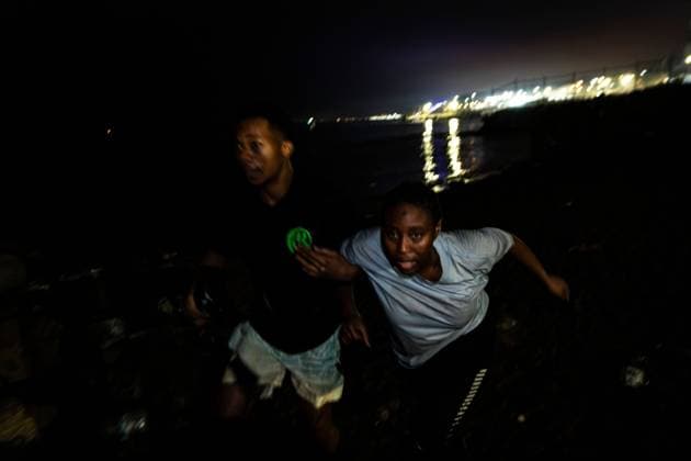 August 1, 2026, Ceuta, Spain: CEUTA, SPAIN - AUGUST 1, 2026: The arrival of migrants across the Tarajal border continues during the early hours of Saturday morning in Ceuta. Authorities maintain security and monitoring devices at the border crossing amid the ongoing influx. Ceuta Spain - ZUMAq101 20260801_zna_q101_067 Copyright: xSamuelxVegax