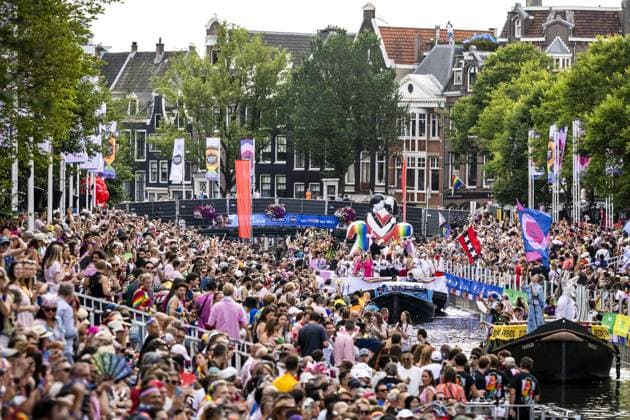AMSTERDAM - Participants and spectators during the Canal Parade. The boat parade is traditionally part of the Pride celebrations in the capital. REMKO DE WAAL ANP netherlands out - belgium out  Copyright: xx x564683010x originalFilename: 564683010.jpg