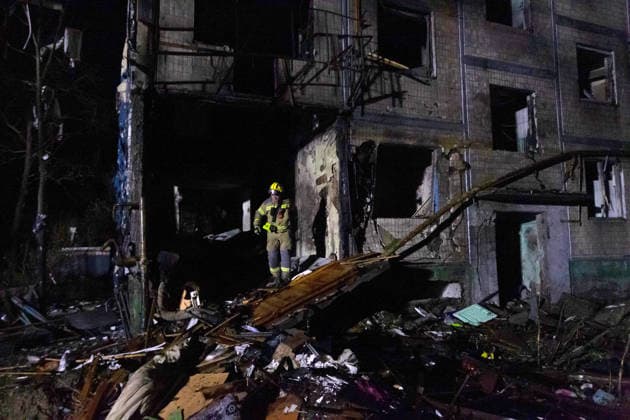 A State Emergency Service rescue worker treads on the collapsed structures of a five-storey apartment block that was partially destroyed in an overnight Russian strike in the Solomianskyi district, Kyiv, Ukraine, August 1, 2026. The attack caused partial collapse and fire in the building. Rescue workers evacuated 35 residents from the upper floors. Two people were killed and eight injured. (Photo by Kyrylo Chubotin Ukrinform) Russian attack damages apartment block in Kyiv’s Solomianskyi district  Copyright: xKyryloxChubotinx
