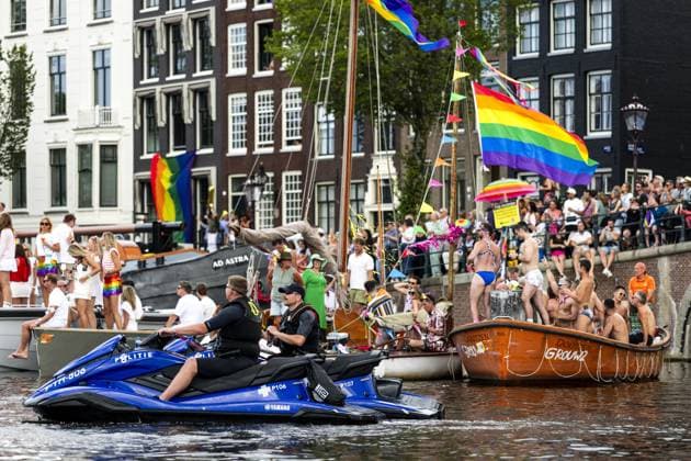 AMSTERDAM - Police on a jet ski during the Canal Parade. The boat parade is traditionally part of the Pride celebrations in the capital. SEM VAN DER WAL ANP netherlands out - belgium out  Copyright: xx x564683498x originalFilename: 564683498.jpg