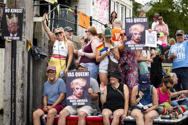 AMSTERDAM - Participants hold up anti-Trump posters during the Canal Parade. The boat parade is traditionally part of the Pride celebrations in the capital. SEM VAN DER WAL ANP netherlands out - belgium out  Copyright: xx x564683730x originalFilename: 564683730.jpg
