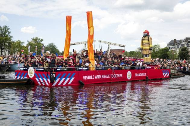 AMSTERDAM - A fire department boat during the Canal Parade. The boat parade is traditionally part of the Pride celebrations in the capital. SEM VAN DER WAL ANP netherlands out - belgium out  Copyright: xx x564684143x originalFilename: 564684143.jpg
