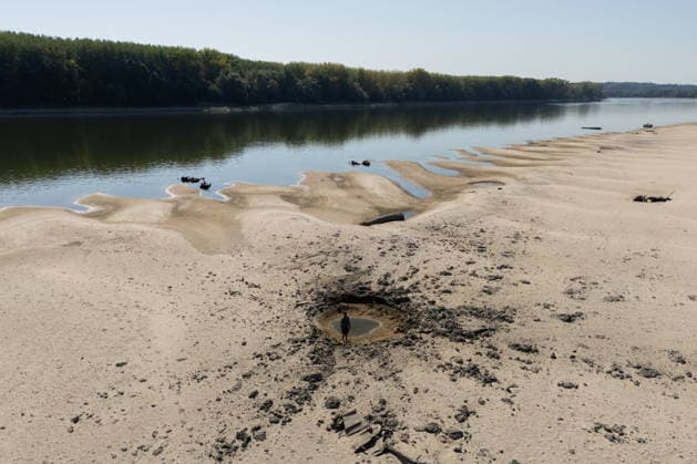Batina 010826. Historically low water level of the Danube has revealed the remains of old cars, ships and weapons in its riverbed. In photo: craters made by recently destroyed bombs. Photo: Marin Franov CROPIX Copyright: xxMarinxFranovx batina_vodostaj56-010826