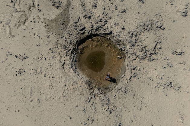 Batina 010826. Historically low water level of the Danube has revealed the remains of old cars, ships and weapons in its riverbed. In photo: craters made by recently destroyed bombs. Photo: Marin Franov CROPIX Copyright: xxMarinxFranovx batina_vodostaj58-010826
