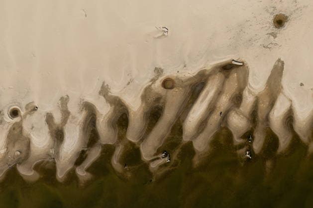 Batina 010826. Historically low water level of the Danube has revealed the remains of old cars, ships and weapons in its riverbed. In photo: craters made by recently destroyed bombs. Photo: Marin Franov CROPIX Copyright: xxMarinxFranovx batina_vodostaj72-010826