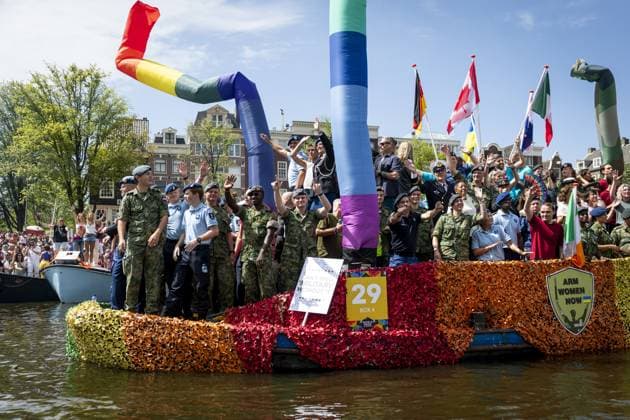 AMSTERDAM - The Ministry of Defence with Minister of Defence Dilan YeÅüilgöz-Zegerius during the Canal Parade. The boat parade is traditionally part of the Pride celebrations in the capital. SEM VAN DER WAL ANP netherlands out - belgium out  Copyright: xx x564685411x originalFilename: 564685411.jpg