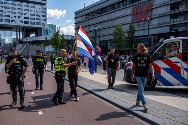 August 1, 2026, Utrecht, Utrecht, The Netherlands: The organization Save Europe Act is kicking off the so-called European Shield Tour at Jaarbeursplein in Utrecht. During the demonstration, several participants are wearing clothing bearing the word Ã¢â‚¬ËœRemigration,Ã¢â‚¬â ¢ and a large banner with the same text is rolled out. Speakers are calling for remigration. Among those present, several Dutch flags and a Flemish flag are visible. Utrecht The Netherlands - ZUMAg281 20260801_zaf_g281_022 Copyright: xStormxGroenendijkx