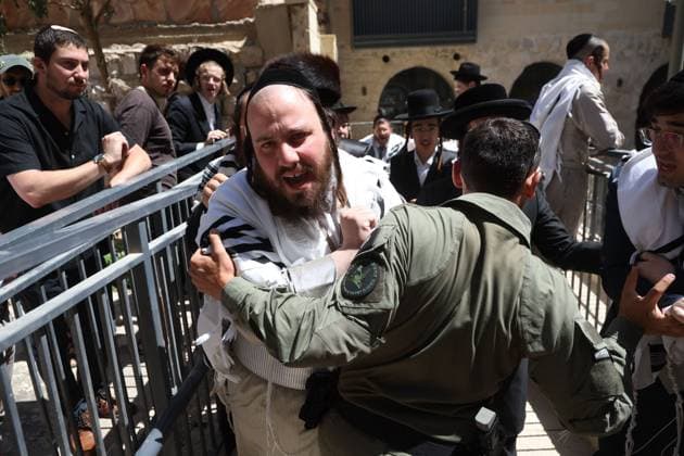 Ultra-Orthodox Protest in Jerusalem WEST JERUSALEM August 1, 2026: Ultra-Orthodox Jewish protesters clash with police officers and secular Jewish demonstrators during a protest against the opening of a cafÃ on Shabbat in West Jerusalem. The demonstration took place after protesters opposed the operation of the cafÃ during the Jewish day of rest. JERUSALEM Israel Copyright: x xSaeedxQaqx xJNAxPressx