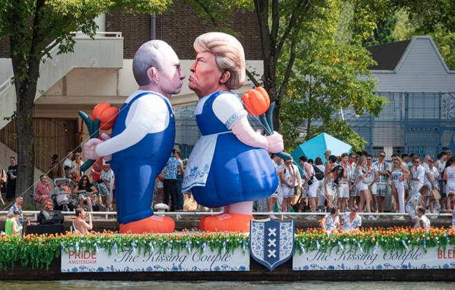 Amsterdam The Netherlands 1st August 2026 A colourful procession of boats makes its way through the Amsterdam Canals for the annual World Pride Canal Parade. Boat with meters high inflatables depicting President of the USA Donald Trump kissing his Russian counterpart Vladimir Putin dressed as a traditional Delft Blue couple. gay, lgbtqi, America, Russia,