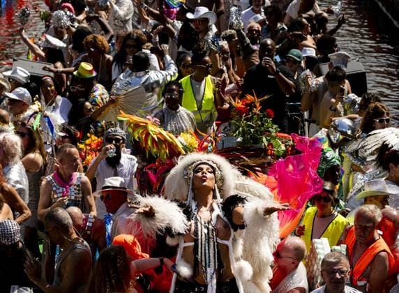 AMSTERDAM - Revelers during the Canal Parade. The boat parade is traditionally part of the Pride celebrations in the capital. REMKO DE WAAL ANP netherlands out - belgium out  Copyright: xx x564690312x originalFilename: 564690312.jpg