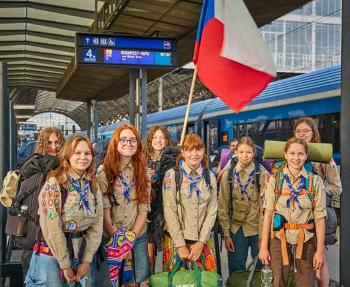 A group of Czech Scouts set out today, on Saturday, August 1st, 2026, on the morning train from the Prague Main Station to Budapest for this year s Central European Jamboree in Hungary, including ten Girl Scouts from Prague-Brevnov who said they would introduce participants from several European countries to some Czech traditions. The girls, who also packed typical Czech snacks into their backpacks, have been going to camps with their troop since their childhood, but for most of them, this is their first international Scouting experience. They are curious about the activities prepared for them by the local Hungarians as well as Scouts from Poland, Slovakia, Romania and other countries, and are looking forward to exchanging scarves, badges a  CTKPhotoP2026080101963