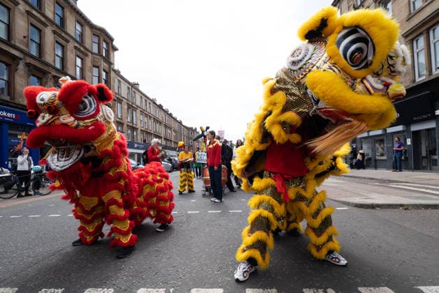 August 1, 2026, Glasgow, Scotland, UK: Hundreds of people took part in this years Govanhill International Festival & Carnival parade, a community-led anti-racist arts and cultural event organised by the Govanhill Baths Community Trust. The annual festival, themed Solidarity this year, was founded in response to racist attacks in the area. Glasgow UK  - ZUMAs357 20260801_zip_s357_004 Copyright: xCameronxScottx