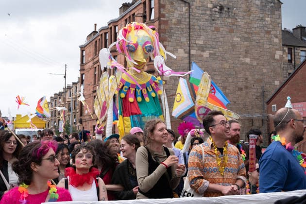 August 1, 2026, Glasgow, Scotland, UK: Hundreds of people took part in this years Govanhill International Festival & Carnival parade, a community-led anti-racist arts and cultural event organised by the Govanhill Baths Community Trust. The annual festival, themed Solidarity this year, was founded in response to racist attacks in the area. Glasgow UK  - ZUMAs357 20260801_zip_s357_019 Copyright: xCameronxScottx