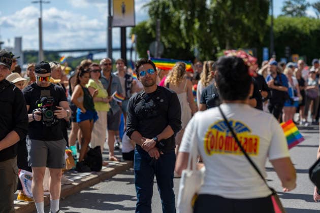 August 1, 2026, Stockholm, Sweden: STOCKHOLM, SWEDEN - AUGUST 1, 2026: Swedish right-wing commentator and journalist Nick Alinia covers the Stockholm Pride Parade, the largest Pride parade in the Nordic region, in central Stockholm. Thousands of people took part in the annual parade celebrating LGBTQ rights, diversity and inclusion. Sweden - ZUMAa136 20260801_zap_a136_017 Copyright: xJoelxLindhex