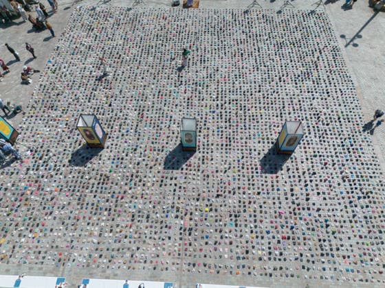 Thousands of shoes displayed on The Hague Beach in memory of children killed in Gaza THE HAGUE, NETHERLANDS - AUGUST 1: Thousands of shoes were placed on Scheveningen Beach in The Hague during a public memorial to symbolize children killed in Gaza. The installation, held near the Kurhaus, formed part of a peaceful demonstration calling attention to the humanitarian impact of the war, with participants gathering throughout the day to pay tribute and express solidarity. Mouneb Taim Anadolu The Hague Netherlands. Editorial use only. Please get in touch for any other usage.  Copyright: x2026xAnadoluxMounebxTaimx
