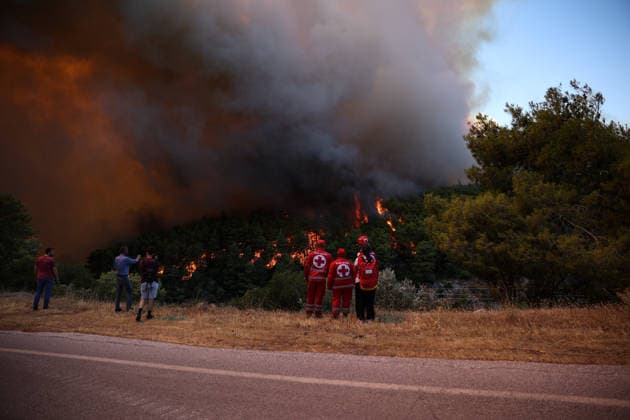 Wildfires in Western Attica, Greece ATTICA, GREECE - AUGUST 01: Firefighters conduct works to extinguish wildfires in Agia Paraskevi, West Attica, Greece on August 1, 2026. Aris Oikonomou Anadolu Attica Greece. Editorial use only. Please get in touch for any other usage.  Copyright: x2026xAnadoluxArisxOikonomoux