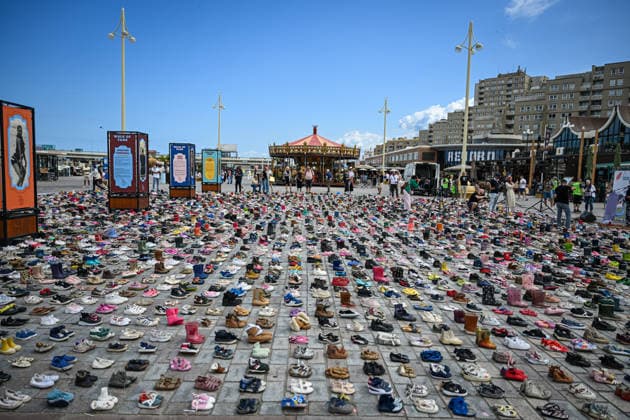 Thousands of shoes displayed on The Hague Beach in memory of children killed in Gaza THE HAGUE, NETHERLANDS - AUGUST 1: Thousands of shoes are placed on Scheveningen Beach during a public memorial to symbolize children killed in Gaza, in The Hagues, Netherlands on August 01, 2026. The installation, held near the Kurhaus, formed part of a peaceful demonstration calling attention to the humanitarian impact of the war, with participants gathering throughout the day to pay tribute and express solidarity. Mouneb Taim Anadolu The Hague Netherlands. Editorial use only. Please get in touch for any other usage.  Copyright: x2026xAnadoluxMounebxTaimx