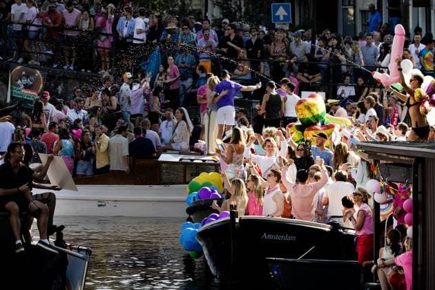 AMSTERDAM - Participants and spectators during the Canal Parade. The boat parade is traditionally part of the Pride celebrations in the capital. RAMON VAN FLYMEN ANP netherlands out - belgium out  Copyright: xx x564701805x originalFilename: 564701805.jpg