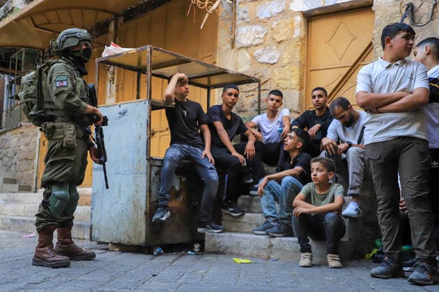 Israeli settlers raid Hebron under the protection of Israeli forces HEBRON, WEST BANK, PALESTINE - AUGUST 1: Israeli settlers raid the Old City area of Hebron under the protection of Israeli forces in Hebron, West Bank, Palestine on August 1, 2026. During the raid, Israeli forces blocked entrances and exits with metal barriers, restricting the movement of Palestinians in the area. Amer Shallodi Anadolu Hebron West Bank. Editorial use only. Please get in touch for any other usage.  Copyright: x2026xAnadoluxAmerxShallodix