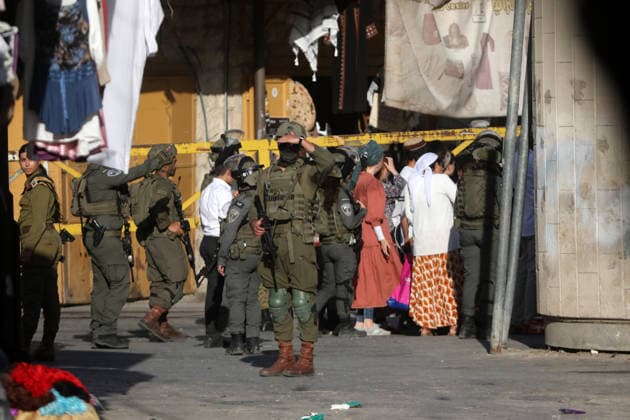 Israeli-protected settlers tour Hebron s Old City Israeli settlers walk through the Old City of Hebron, in the occupied West Bank, under the protection of Israeli troops after the forces closed roads and alleys in the area, restricting the movement of Palestinian residents during the raid, on August 1, 2026. Photo by Mamoun Wazwaz apaimages Hebron West Bank Palestinian Territory 010826_Hebron_MW_00(35) Copyright: xapaimagesxMamounxWazwazx xapaimagesx