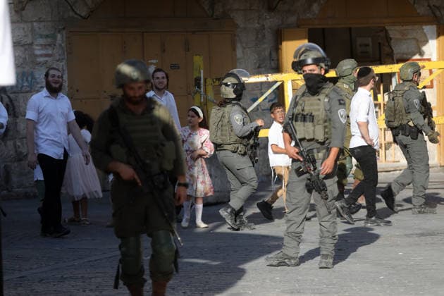 Israeli-protected settlers tour Hebron s Old City Israeli settlers walk through the Old City of Hebron, in the occupied West Bank, under the protection of Israeli troops after the forces closed roads and alleys in the area, restricting the movement of Palestinian residents during the raid, on August 1, 2026. Photo by Mamoun Wazwaz apaimages Hebron West Bank Palestinian Territory 010826_Hebron_MW_00(25) Copyright: xapaimagesxMamounxWazwazx xapaimagesx