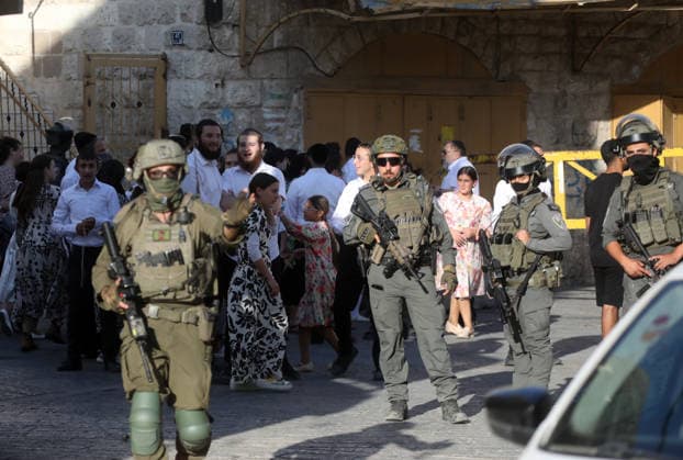 Israeli-protected settlers tour Hebron s Old City Israeli settlers walk through the Old City of Hebron, in the occupied West Bank, under the protection of Israeli troops after the forces closed roads and alleys in the area, restricting the movement of Palestinian residents during the raid, on August 1, 2026. Photo by Mamoun Wazwaz apaimages Hebron West Bank Palestinian Territory 010826_Hebron_MW_00(31) Copyright: xapaimagesxMamounxWazwazx xapaimagesx