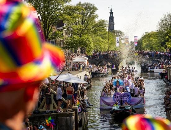 AMSTERDAM - Revelers during the Canal Parade. The boat parade is traditionally part of the Pride celebrations in the capital. REMKO DE WAAL ANP netherlands out - belgium out  Copyright: xx x564704633x originalFilename: 564704633.jpg