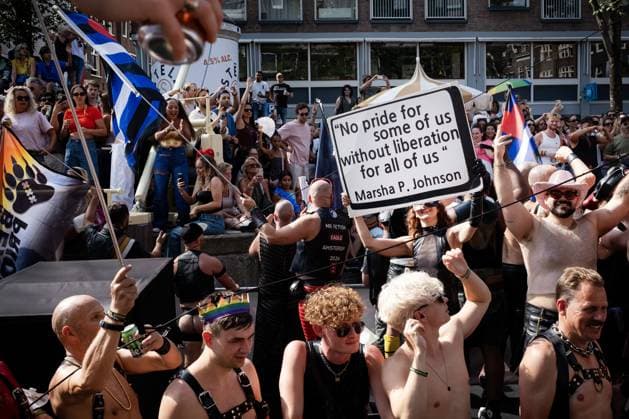 AMSTERDAM - Participants and spectators during the Canal Parade. The boat parade is traditionally part of the Pride celebrations in the capital. RAMON VAN FLYMEN ANP netherlands out - belgium out  Copyright: xx x564705020x originalFilename: 564705020.jpg