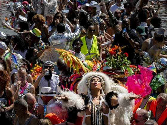 AMSTERDAM - Revelers during the Canal Parade. The boat parade is traditionally part of the Pride celebrations in the capital. REMKO DE WAAL ANP netherlands out - belgium out  Copyright: xx x564706978x originalFilename: 564706978.jpg