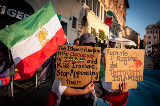 August 1, 2026, Rome, Rm, Italy: Members of the anti-regime Iranian community in Rome gather in Largo Torre Argentina. They are protesting against the repression and executions of opponents carried out by the Iranian regime and support the return to power of Crown Prince Reza Pahlavi. Stop the regime of Islamic terrorists reads one of the sign. Rome Italy  - ZUMAg256 20260801_znp_g256_005 Copyright: xMarcoxDixGianvitox