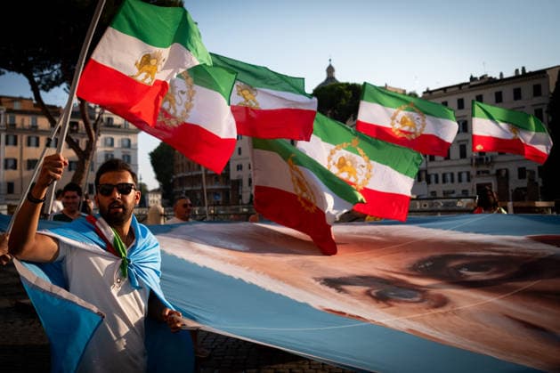August 1, 2026, Rome, Rm, Italy: Members of the anti-regime Iranian community in Rome gather in Largo Torre Argentina. They are protesting against the repression and executions of opponents carried out by the Iranian regime and support the return to power of Crown Prince Reza Pahlavi. Rome Italy - ZUMAg256 20260801_znp_g256_004 Copyright: xMarcoxDixGianvitox