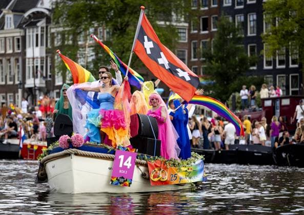AMSTERDAM - Participants on a boat during the Canal Parade. The boat parade is traditionally part of the Pride celebrations in the capital. SEM VAN DER WAL ANP netherlands out - belgium out  Copyright: xx x564711615x originalFilename: 564711615.jpg