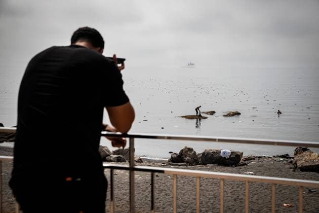 August 1, 2026, Ceuta, Spain: CEUTA, SPAIN - AUGUST 1, 2026: Migrants who remained in Ceuta cross back into Morocco through the Tarajal border crossing during the early morning hours. Ceuta Spain - ZUMAq101 20260801_zna_q101_103 Copyright: xSamuelxVegax