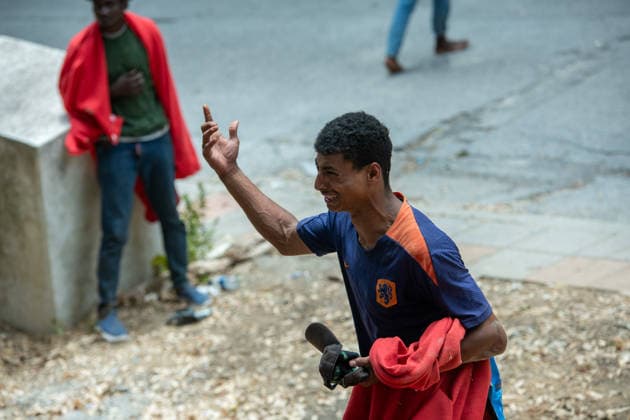 August 1, 2026, Ceuta, Ceuta, Spain: Migrants fight for food near the CETI temporary stay centre. Ceuta Spain - ZUMAd308 20260801_zsp_d308_059 Copyright: xJuanxCarlosxLucasx