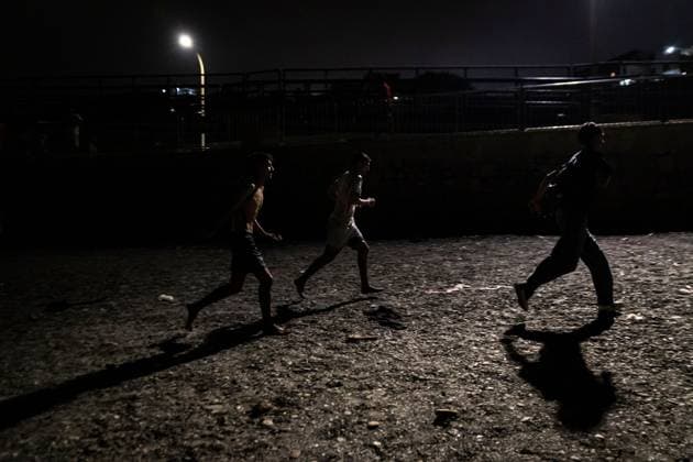 August 1, 2026, Ceuta, Spain: CEUTA, SPAIN - AUGUST 1, 2026: The arrival of migrants across the Tarajal border continues during the early hours of Saturday morning in Ceuta. Authorities maintain security and monitoring devices at the border crossing amid the ongoing influx. Ceuta Spain - ZUMAq101 20260801_zna_q101_066 Copyright: xSamuelxVegax