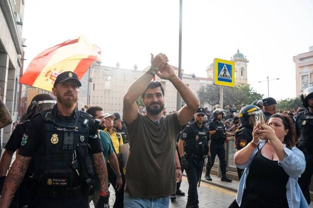 August 1, 2026, Ceuta, Spain: CEUTA, Spain Ã¢â‚¬ August 1, 2026: Demonstrators gather in Ceuta to protest against far-right groups following calls for an anti-immigration rally after the arrival of tens of thousands of migrants. Authorities blocked the entry of members of the group NoÂºcleo Nacional, while activist Alvise Po rez entered the city and later left under police escort. Ceuta Spain - ZUMAq101 20260801_zna_q101_217 Copyright: xMarioxMoroÂ³Nx