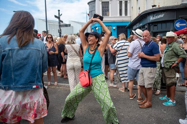August 1, 2026, Margate, United Kingdom: A reveller dances front of the stage during the Margate Soul Festival. The Margate Soul Weekender (also known as Margate Soul Festival) celebrated its 25th anniversary from Friday, July 31 to Sunday, August 2, 2026. It is widely recognized as the UK s largest independent soul street party and festival. Spanning three days, it transforms the seaside town into a massive celebration of soul, funk, jazz-funk, reggae, and R&B. Margate United Kingdom - ZUMAs197 20260801_aaa_s197_108 Copyright: xKrisztianxElekx
