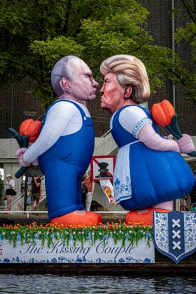 August 1, 2026, Amsterdam, North Holland, Netherlands: Two float balloons of Presidents Vladimir Putin and Donald Trump kiss as part of an Amsterdam Pride Canal Parade float. August 1, 2026, Amsterdam, the Netherlands. Hundreds of thousands of spectators joined the 30th edition of the Pride Canal Parade, the highlight of WorldPride Amsterdam 2026. This yearÃ¢â‚¬â ¢s parade also included the WorldPride Stadium grandstand, with seating for approximately 10,000 people to watch as floats pass. Amsterdam Netherlands - ZUMAp202 20260801_zip_p202_017 Copyright: xJamesxPetermeierx